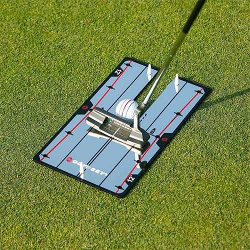 Odyssey putting mat with blue and white design, black edges.
