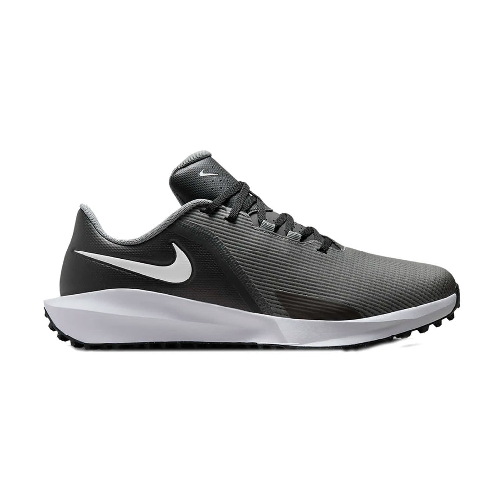 Black and white nike golf shoe with textured upper material.