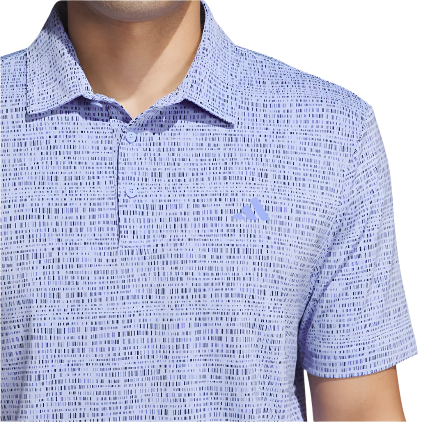 Lavender adidas polo shirt with abstract pattern and short sleeves.