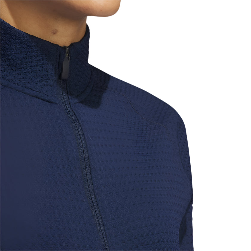 Navy blue zip-up jacket with a textured pattern and sleek design.