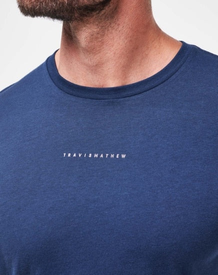 Travismathew navy blue crew neck t-shirt with embroidered logo.