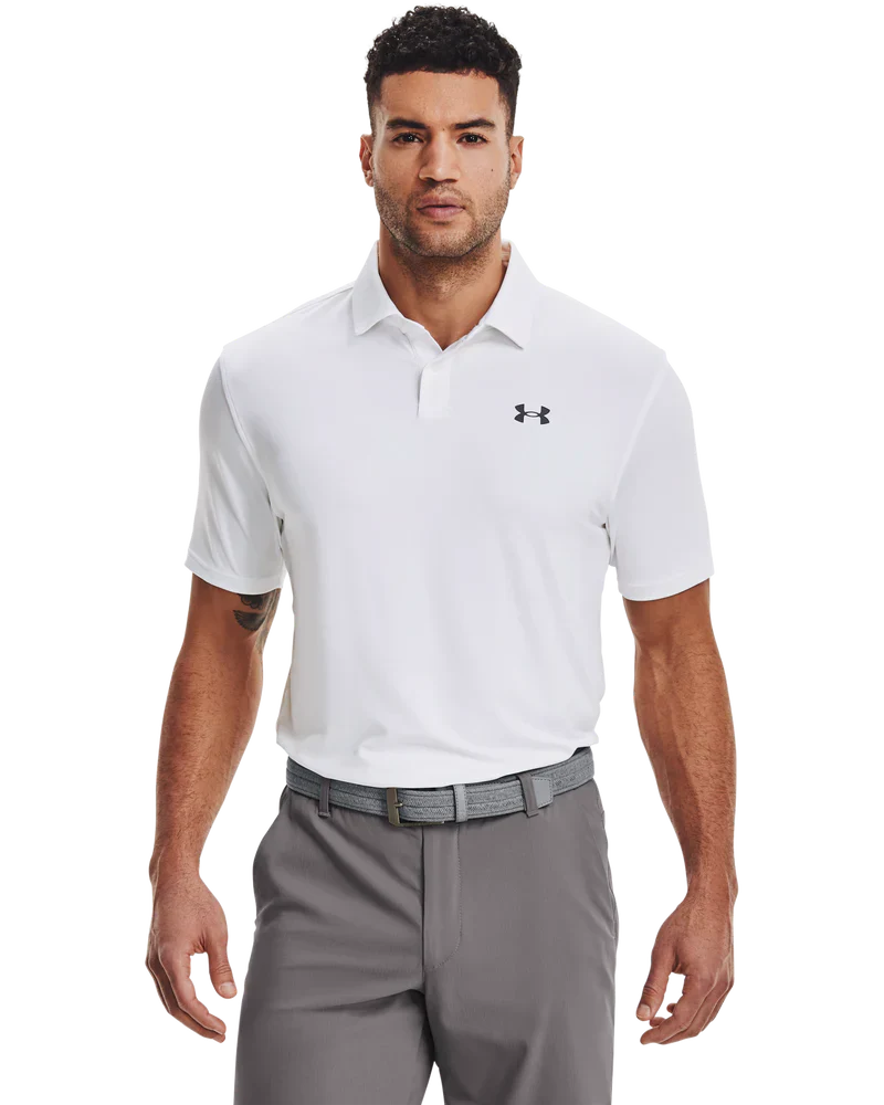 White under armour polo shirt with black logo and gray pants.